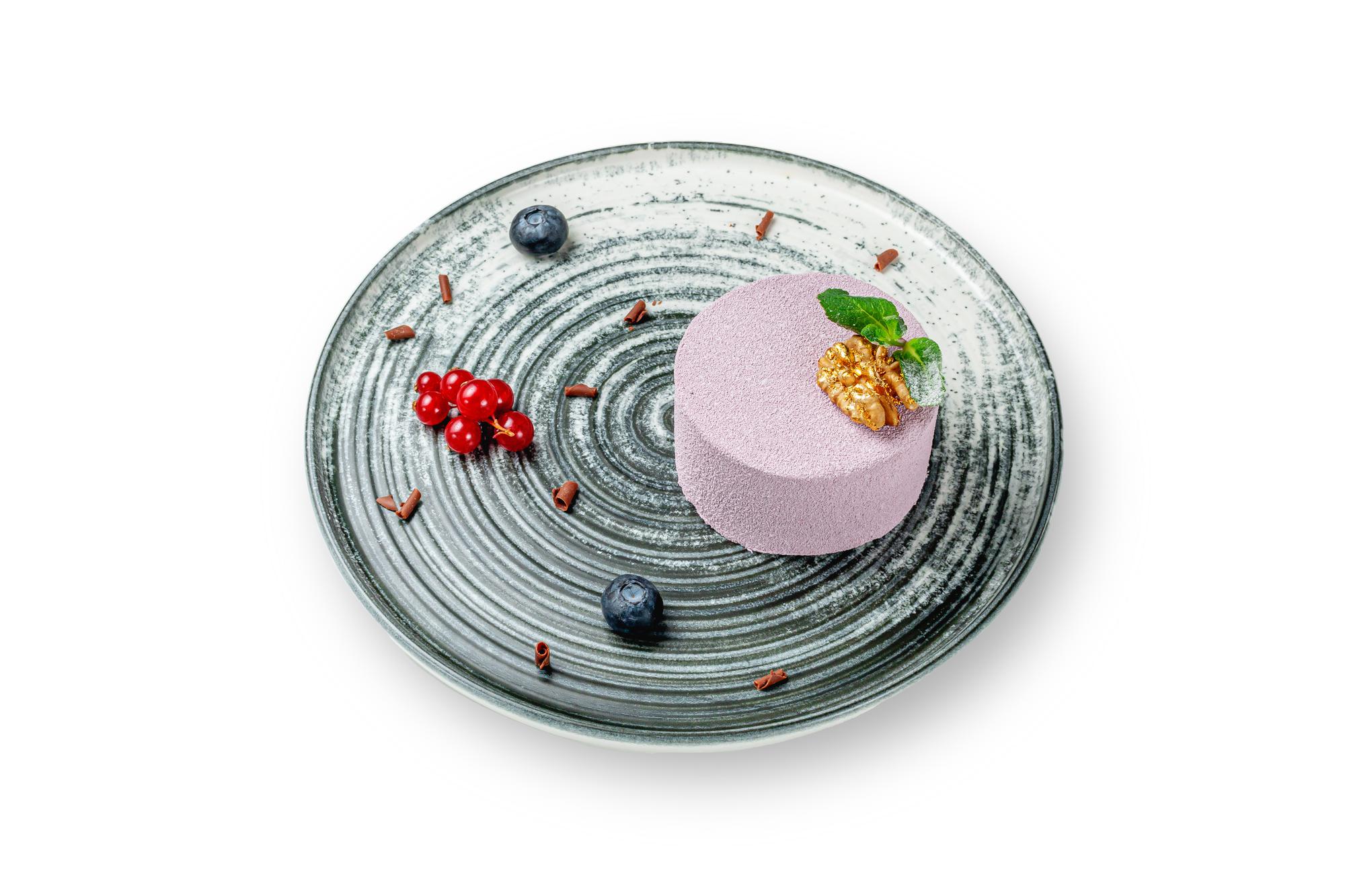 Large plated dish with molecular garnish